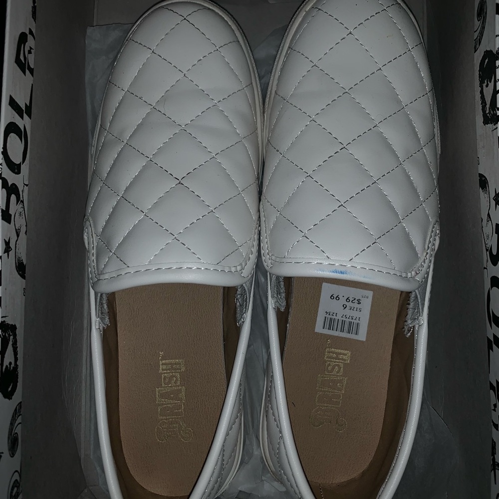 White/tan leather slip on shoes